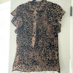Bebe Leopard Top Flutter sleeves and tie neck. sheer with velvet detail Size M